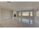 Large living room with a fireplace and plenty of natural light at 1656 Black Fox Canyon Rd, Henderson, NV 89052