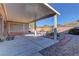 Extended covered patio, offering ample shade and outdoor space at 1656 Black Fox Canyon Rd, Henderson, NV 89052