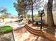 Landscaped backyard with patio and pool view at 1813 Francisco Peak Pl, Las Vegas, NV 89128