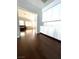 Long hallway with hardwood floors and built-in storage at 1813 Francisco Peak Pl, Las Vegas, NV 89128