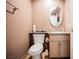 Clean bathroom with granite countertop and wood cabinets at 2000 White Falls St, Las Vegas, NV 89128