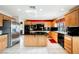 Spacious kitchen featuring an island, stainless steel appliances, and granite countertops at 2000 White Falls St, Las Vegas, NV 89128