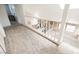 Upstairs hallway with carpet and view of the living room at 2000 White Falls St, Las Vegas, NV 89128