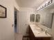 Well-lit bathroom with vanity, sink, and tiled floor at 2076 Mesquite Ln # 302, Laughlin, NV 89029