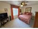 Spacious bedroom with a king-size bed and ceiling fan at 2076 Mesquite Ln # 302, Laughlin, NV 89029