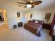 Comfortable bedroom with ceiling fan and window at 2076 Mesquite Ln # 302, Laughlin, NV 89029