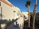 Apartment building exterior with stairs and walkway at 2076 Mesquite Ln # 302, Laughlin, NV 89029