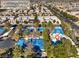 Aerial view of community pool and surrounding buildings at 2132 Petersham Ct # D, Las Vegas, NV 89108