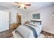 Bedroom with a bed, dresser and walk-in closet at 2132 Petersham Ct # D, Las Vegas, NV 89108