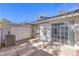 Rear exterior view, showing private patio and AC unit at 2132 Petersham Ct # D, Las Vegas, NV 89108