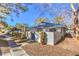 Side view of a house with blue roof tiles and a walkway at 2132 Petersham Ct # D, Las Vegas, NV 89108