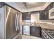 Bright kitchen, stainless steel appliances, granite counters at 2132 Petersham Ct # D, Las Vegas, NV 89108