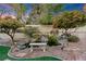 Relaxing backyard oasis with waterfall, pond and lush landscaping at 2228 Lucerne Ct, Henderson, NV 89014