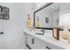 Modern bathroom with white cabinets and quartz countertops at 2228 Lucerne Ct, Henderson, NV 89014