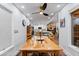 Dining room with wood table and view into the updated kitchen at 2228 Lucerne Ct, Henderson, NV 89014