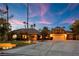 House exterior at dusk, showcasing landscaping and driveway at 2228 Lucerne Ct, Henderson, NV 89014