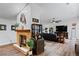 Cozy stone fireplace in living room with shiplap wall at 2228 Lucerne Ct, Henderson, NV 89014