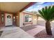 Inviting front door entry with brick walkway and landscaping at 2228 Lucerne Ct, Henderson, NV 89014