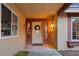 Inviting front door entry with brick and a wreath at 2228 Lucerne Ct, Henderson, NV 89014