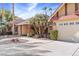 Two-car garage with automatic door opener and ample driveway space at 2228 Lucerne Ct, Henderson, NV 89014