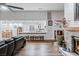 Open living space with kitchen views and hardwood floors at 2228 Lucerne Ct, Henderson, NV 89014