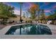 Inviting swimming pool with a spa and spacious patio area at 2228 Lucerne Ct, Henderson, NV 89014