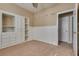 Bedroom with built-in shelving and access to hallway at 2245 Juniper Berry Dr, Las Vegas, NV 89134