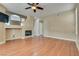 Living room featuring hardwood floors and a fireplace at 2245 Juniper Berry Dr, Las Vegas, NV 89134