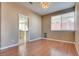 Spacious living room with hardwood floors and views into the kitchen at 2245 Juniper Berry Dr, Las Vegas, NV 89134