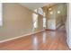 Open living room with hardwood floors and a staircase at 2245 Juniper Berry Dr, Las Vegas, NV 89134