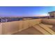 Private balcony with city views at dusk at 2376 Switchback Valley St, Las Vegas, NV 89138