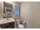 Small bathroom with single vanity and toilet at 2376 Switchback Valley St, Las Vegas, NV 89138