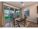 Dining area with sliding glass doors and view of backyard at 2376 Switchback Valley St, Las Vegas, NV 89138