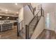 Modern entryway with staircase and kitchen view at 2376 Switchback Valley St, Las Vegas, NV 89138