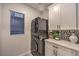 Laundry room with stackable washer and dryer at 2376 Switchback Valley St, Las Vegas, NV 89138