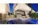 Private pool with patio furniture and outdoor dining area at 28 Heron Harbour Dr, Henderson, NV 89011