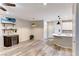 Bright living room with hardwood floors and kitchen island at 2844 Alenga St, Henderson, NV 89044