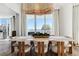 Modern dining room with a large table, stunning city views and chandelier at 2857 Paradise Rd # 2203, Las Vegas, NV 89109