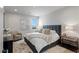 Guest bedroom with a plush bed and rug at 29 Falling Ridge Ln, Henderson, NV 89011