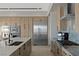 Modern kitchen with stainless steel appliances and ample cabinetry at 29 Falling Ridge Ln, Henderson, NV 89011