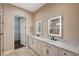 Elegant bathroom with double vanity and walk-in closet access at 3004 Canton Hills St, Henderson, NV 89052