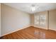 Bright bedroom with wood flooring and plantation shutters at 3004 Canton Hills St, Henderson, NV 89052