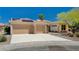 House with three-car garage, solar panels and desert landscaping at 3004 Canton Hills St, Henderson, NV 89052