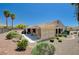 Single story house with desert landscaping at 3004 Canton Hills St, Henderson, NV 89052