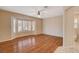 Bright living room featuring hardwood floors and a large bay window at 3004 Canton Hills St, Henderson, NV 89052