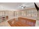 Spacious living room with hardwood floors and a fireplace at 3004 Canton Hills St, Henderson, NV 89052