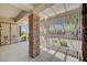 Covered patio with stone columns and pergola at 3004 Canton Hills St, Henderson, NV 89052