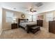 Bright bedroom with wooden furniture and a ceiling fan at 3158 Biancavilla Ave, Henderson, NV 89044