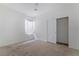 Bright bedroom featuring a sizable closet and carpet flooring at 358 Terrill Ave, Las Vegas, NV 89183