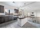 Modern kitchen with dark cabinetry, granite counters, and large island at 358 Terrill Ave, Las Vegas, NV 89183